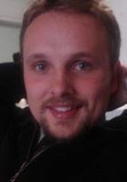 A photo of Eli, a tutor from Portland State University