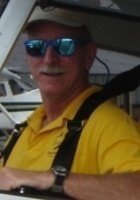 A photo of Ken, a tutor from USF