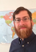 A photo of Thomas, a tutor from SUNY at Geneseo