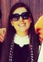 A photo of Roxanne, a tutor from Southwestern University