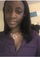 A photo of Arnelle, a tutor from Mercy College