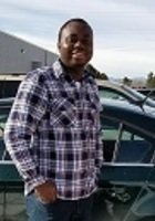 A photo of Justice, a tutor from Kwame Nkrumah University of Science and Technology