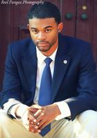 A photo of Caleb, a tutor from Howard University