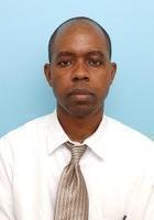 A photo of George, a tutor from Egerton University
