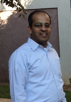 A photo of Venkat, a tutor from Andhra University India