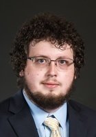 A photo of Truman, a tutor from University of Kansas