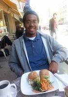 A photo of Tunde, a tutor from Columbia University in the City of New York