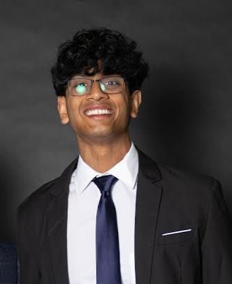 Cambridge Yoga tutor named Arjun